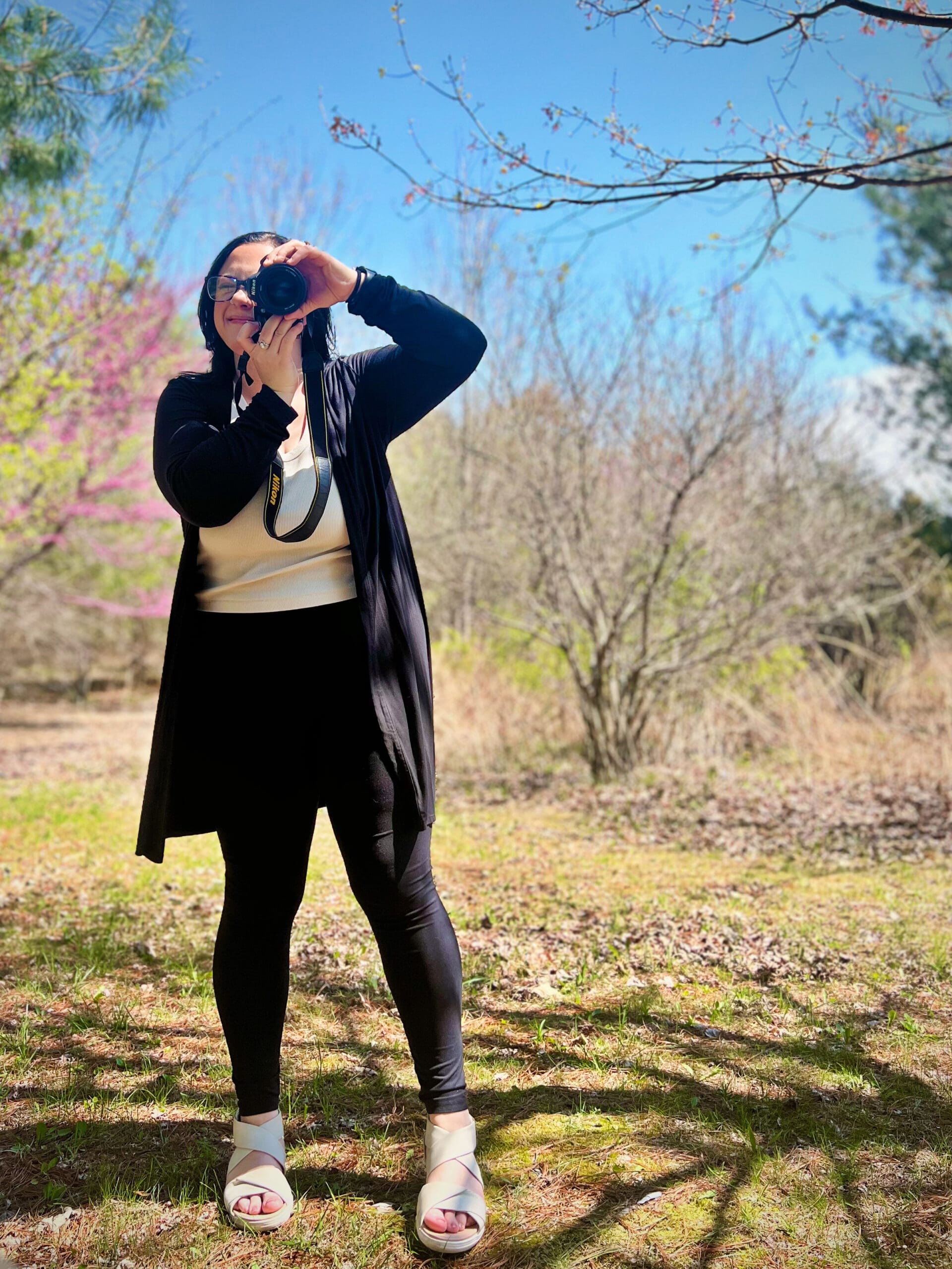 Photographer that also works as a therapist is seen taking a photo at Kittatinny Valley State Park in Sussex County, NJ.